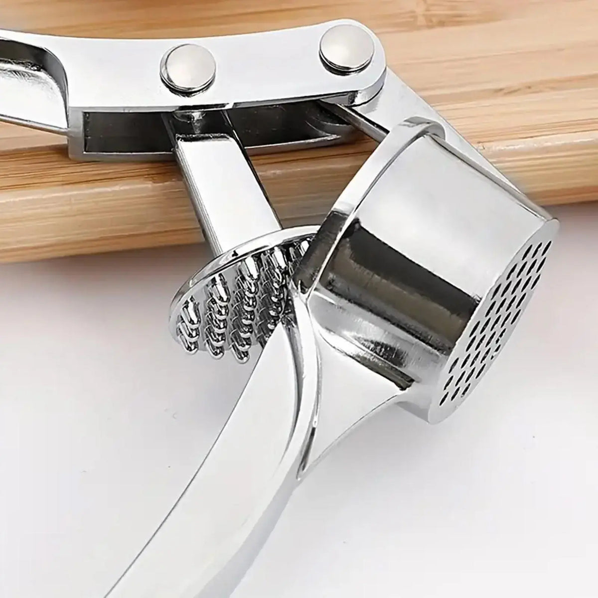 5-in-1 Stainless Steel Garlic Press Multi-Tool - Durable Kitchen Utensil with Mincer, Crusher, Bottle Opener, and Pit Remover, Easy to Clean